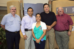 Two Shoshone-Bannock Tribes (SBT) officials are visiting the Department of Energy (DOE) Carlsbad Field Office (CBFO) and Waste Isolation Pilot Plant (WIPP) near Carlsbad, New Mexico, June 12-13, 2012, for emergency response training provided by WIPP. They were greeted on arrival at the CBFO, which has a cooperative agreement with the SBT, in-town offices and paused for a photo. From left to right are: CBFO National Transuranic (TRU) Program (NTP) Institutional Affairs Manager Bill Mackie; Washington TRU Solutions LLC, the WIPP management and operating contractor, President and General Manager Farok Sharif; SBT Public Affairs Manager RandyL Teton; SBT Executive Director Angelo Gonzales; and CBFO NTP Director J.R. Stroble. The SBT are located on the Fort Hall Reservation in Southeastern Idaho.